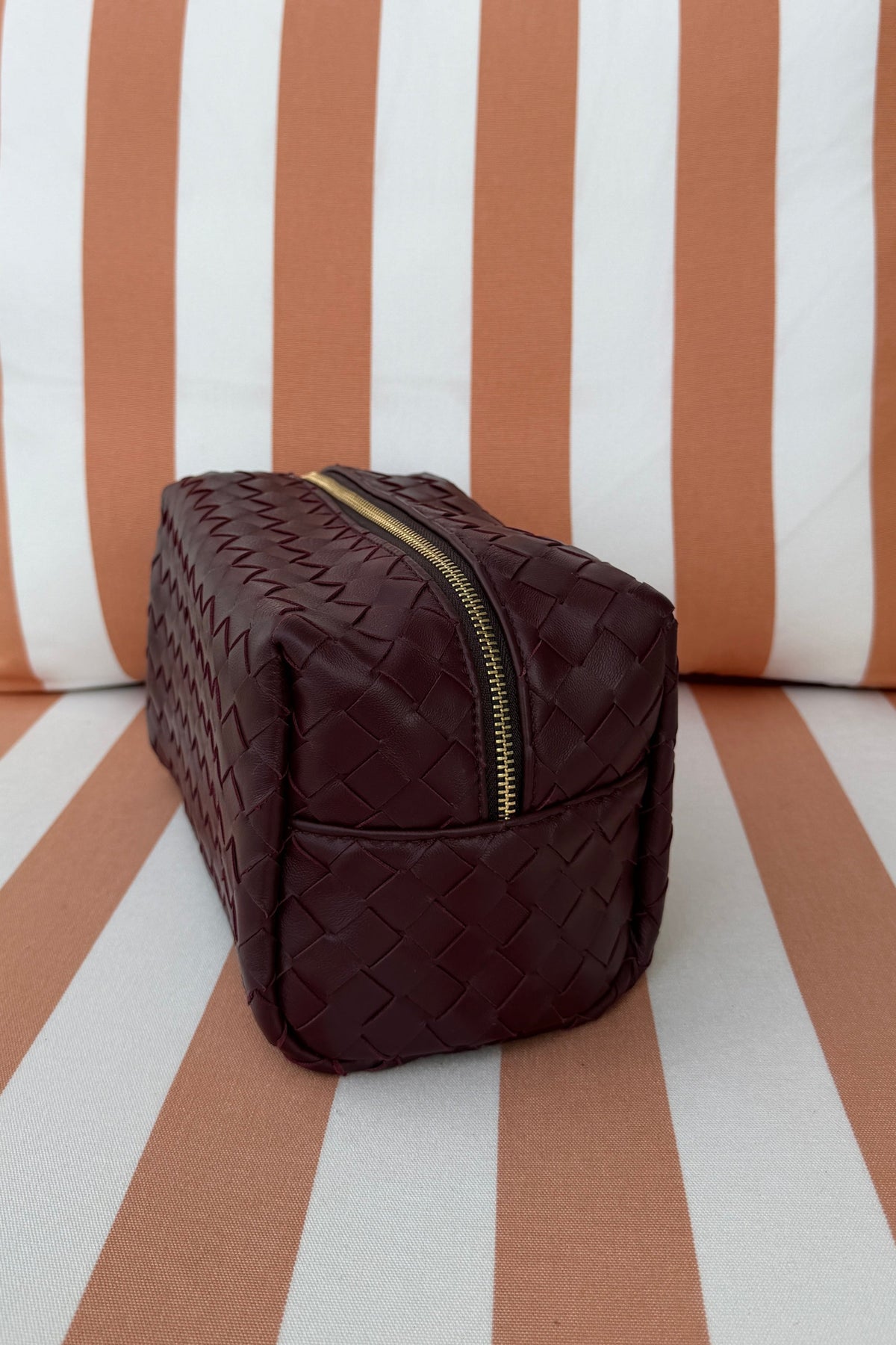 burgundy leather pouch Estelle Finefurs x media label with gold zips make up bag travel essentials