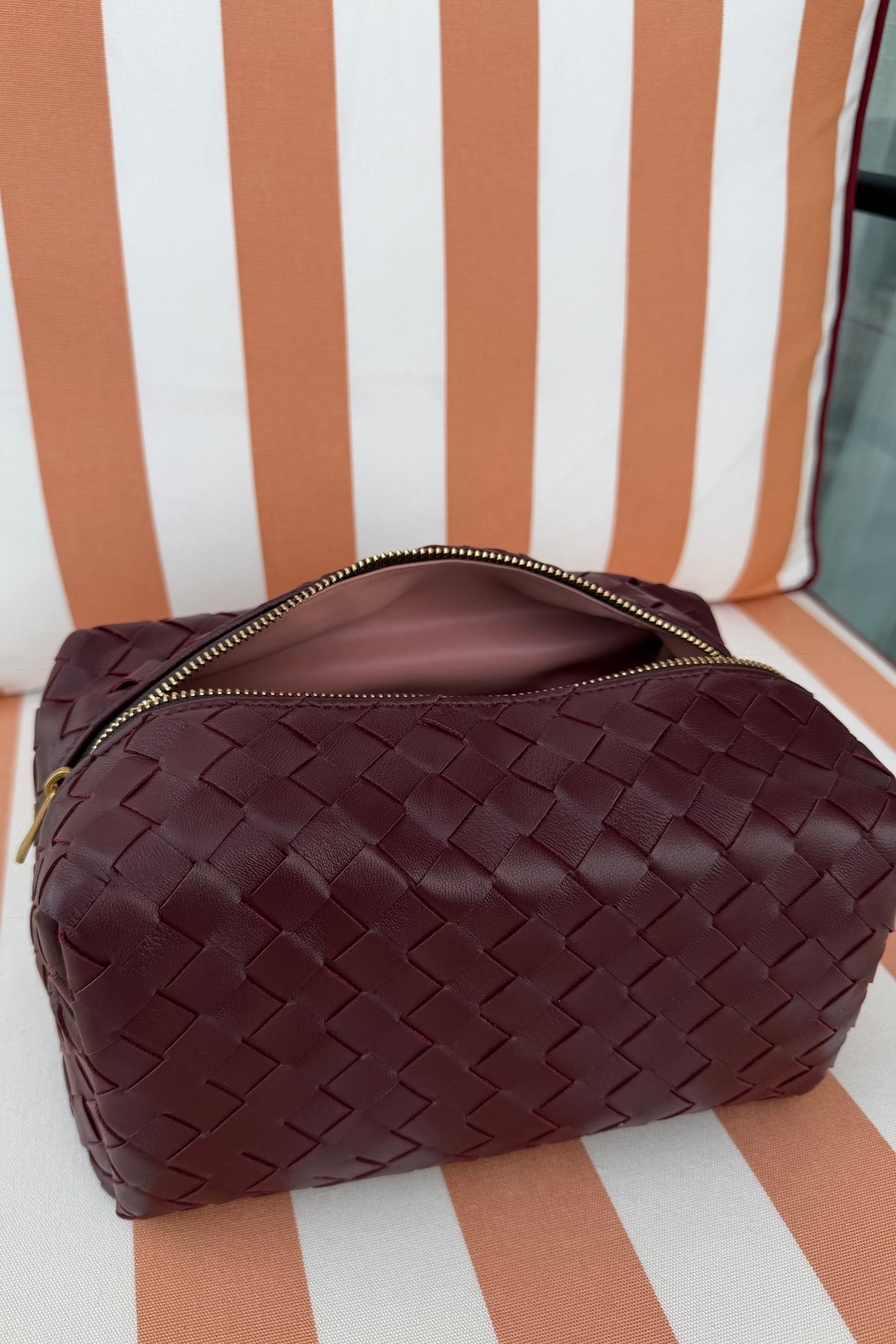 burgundy leather pouch Estelle Finefurs x media label with gold zips make up bag travel essentials